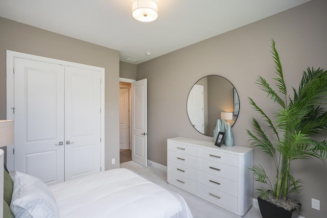 5963 Hunt Valley Dr, Spring Hill, TN 37174 - bedroom featuring a closet, baseboards, and light carpet