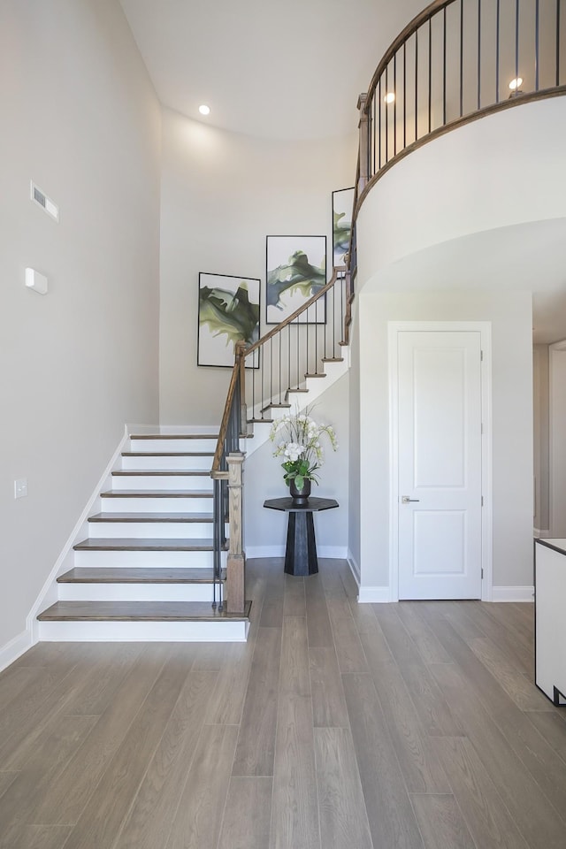 5963 Hunt Valley Dr, Spring Hill, TN 37174 - staircase with wood finished floors, baseboards, and recessed lighting