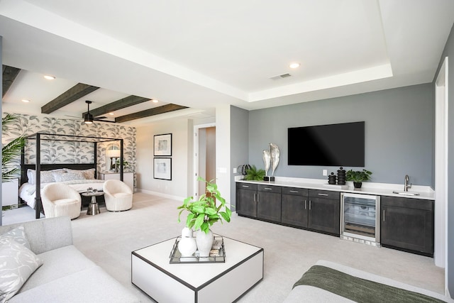 5963 Hunt Valley Dr, Spring Hill, TN 37174 - carpeted living area with beverage cooler, wet bar, beam ceiling, baseboards, and recessed lighting
