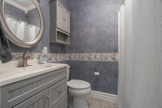 bathroom with toilet, a shower with curtain, wallpapered walls, vanity, and ornamental molding