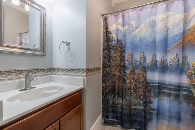 bathroom with vanity and a shower with shower curtain