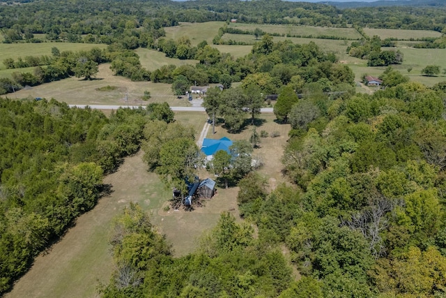 birds eye view of property featuring a rural view