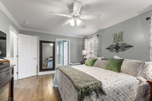 bedroom with a ceiling fan, ornamental molding, and wood-type flooring