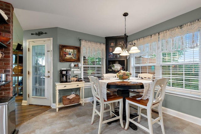 dining room featuring baseboards