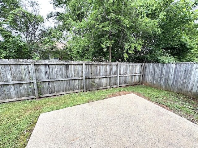 view of patio with a fenced backyard