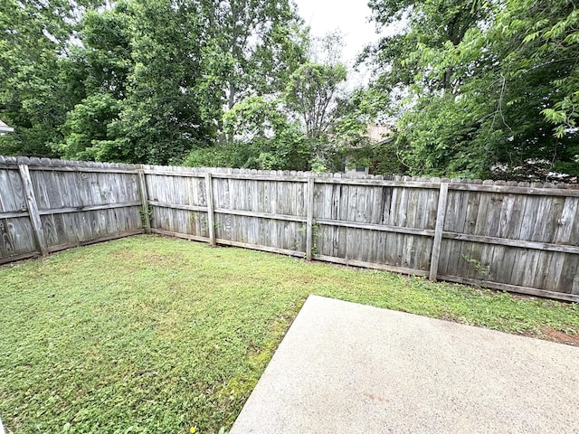view of yard with a patio area