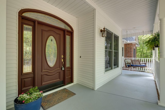 property entrance with a porch
