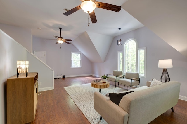 living room with ceiling fan, stairs, baseboards, and dark wood finished floors