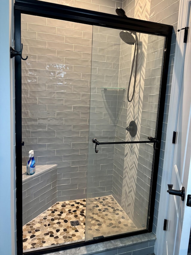 full bathroom with a stall shower