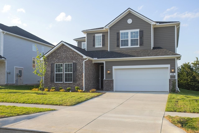 126 W Cassa Way, Mount Juliet, TN 37122 - view of front of home with concrete driveway, a front lawn, brick siding, and a garage