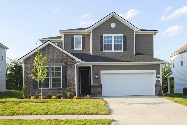 126 W Cassa Way, Mount Juliet, TN 37122 - view of front of property featuring brick siding, concrete driveway, a garage, a front lawn, and central AC unit