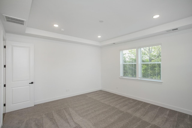 126 W Cassa Way, Mount Juliet, TN 37122 - carpeted empty room featuring a tray ceiling, visible vents, and recessed lighting