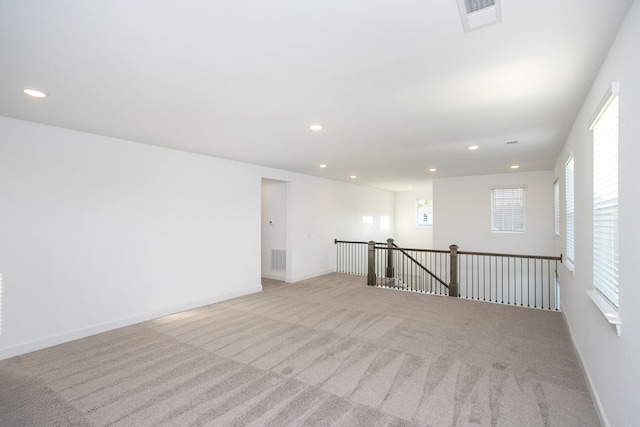 126 W Cassa Way, Mount Juliet, TN 37122 - empty room featuring light colored carpet, visible vents, baseboards, and recessed lighting