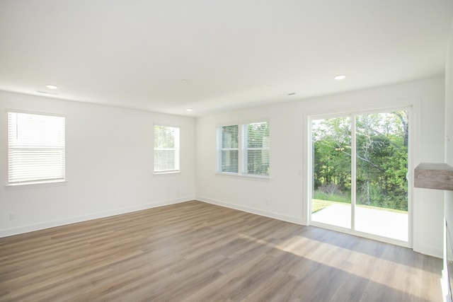 132 W Cassa Way, Mount Juliet, TN 37122 - unfurnished room with light wood finished floors, baseboards, and recessed lighting