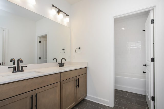 132 W Cassa Way, Mount Juliet, TN 37122 - bathroom with baseboards, tile patterned floors, double vanity, and a sink