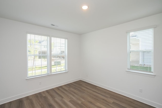 132 W Cassa Way, Mount Juliet, TN 37122 - spare room featuring baseboards, visible vents, and dark wood-style floors