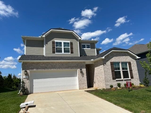 132 W Cassa Way, Mount Juliet, TN 37122 - traditional home with an attached garage, concrete driveway, and brick siding