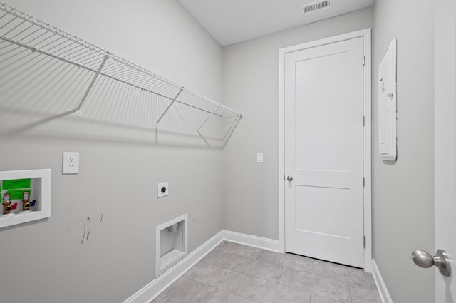2131 Gunwale Mews, Franklin, TN 37064 - laundry area with electric dryer hookup, hookup for a washing machine, baseboards, and light tile patterned flooring