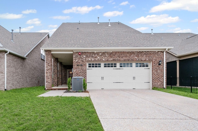 2131 Gunwale Mews, Franklin, TN 37064 - view of front facade featuring brick siding, central air condition unit, concrete driveway, and an attached garage