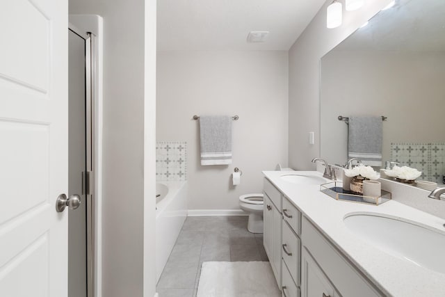 bathroom with toilet, a bathtub, tile patterned flooring, and a sink