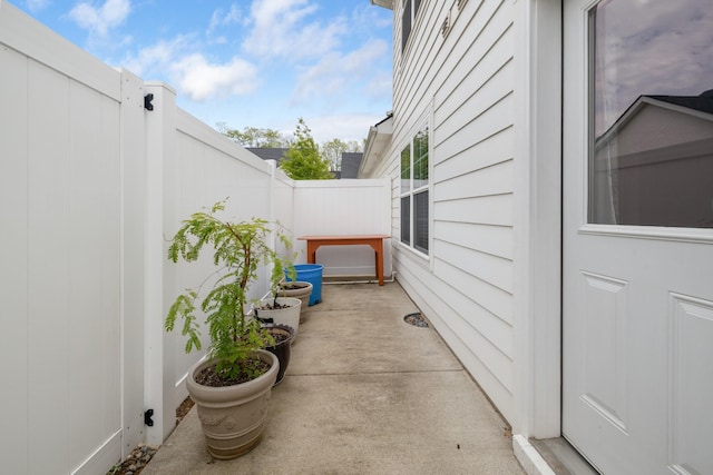 view of side of home featuring a fenced backyard