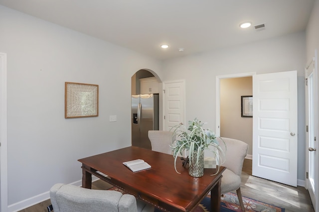 2804 Sonoma Way, Columbia, TN 38401 - dining area with arched walkways, light wood-type flooring, baseboards, and recessed lighting