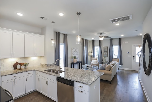 2804 Sonoma Way, Columbia, TN 38401 - kitchen featuring a sink, a peninsula, visible vents, dishwasher, and backsplash