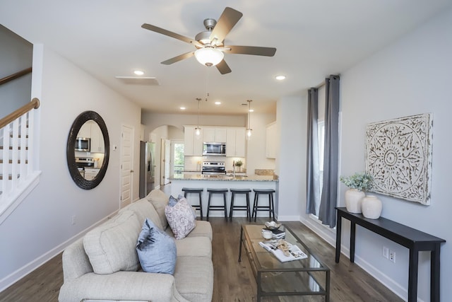 2804 Sonoma Way, Columbia, TN 38401 - living area with a ceiling fan, recessed lighting, baseboards, arched walkways, and dark wood-style floors