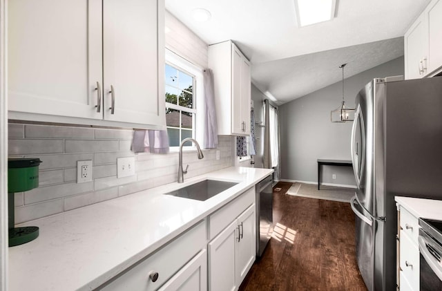 5000 Trailwater Dr, Antioch, TN 37013 - kitchen with a sink, stainless steel appliances, white cabinets, backsplash, and dark wood-style floors