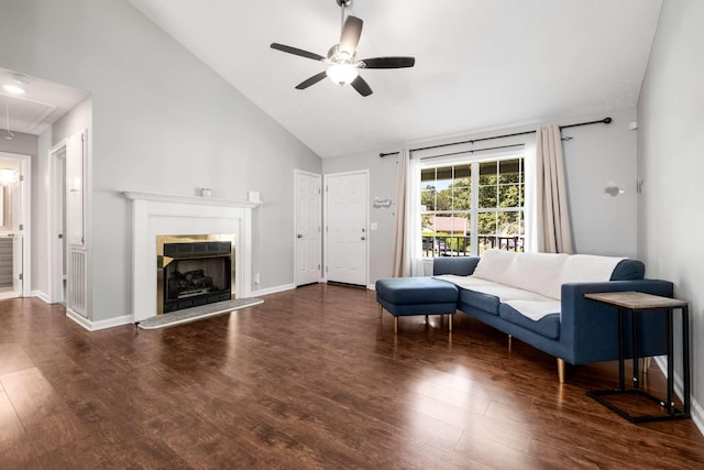 5000 Trailwater Dr, Antioch, TN 37013 - living area featuring attic access, a ceiling fan, wood finished floors, a fireplace with raised hearth, and high vaulted ceiling
