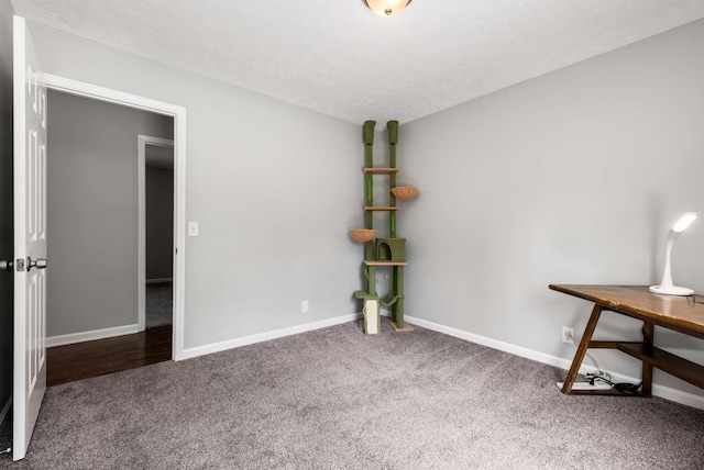 5000 Trailwater Dr, Antioch, TN 37013 - unfurnished bedroom featuring carpet, baseboards, and a textured ceiling