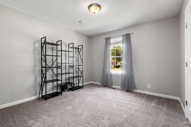 5000 Trailwater Dr, Antioch, TN 37013 - carpeted spare room with baseboards and a textured ceiling
