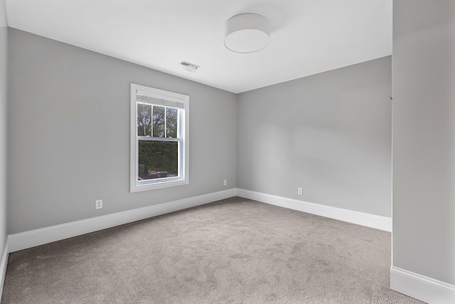 2221 10th Ave S, Nashville, TN 37204 - carpeted spare room featuring baseboards