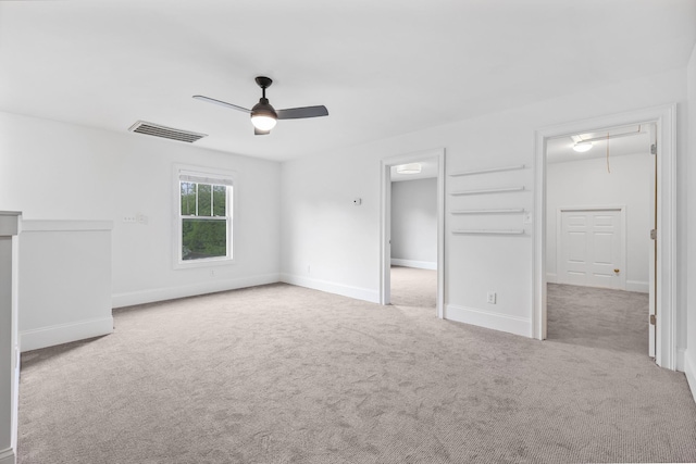 2221 10th Ave S, Nashville, TN 37204 - unfurnished bedroom with attic access, carpet floors, a ceiling fan, and baseboards