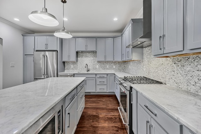 2221 10th Ave S, Nashville, TN 37204 - kitchen with high quality appliances, wall chimney exhaust hood, gray cabinetry, a sink, and light stone counters