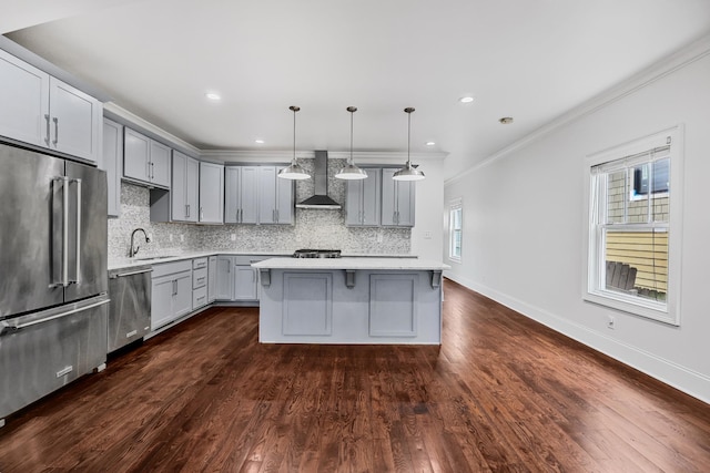 2221 10th Ave S, Nashville, TN 37204 - kitchen with appliances with stainless steel finishes, wall chimney range hood, gray cabinetry, light countertops, and tasteful backsplash
