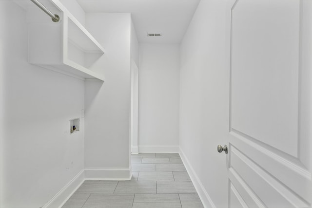 2221 10th Ave S, Nashville, TN 37204 - laundry area featuring hookup for a washing machine and baseboards