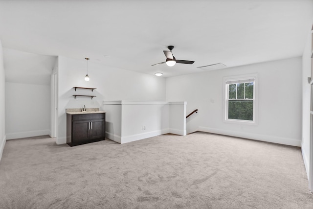 2221 10th Ave S, Nashville, TN 37204 - unfurnished room with a ceiling fan, light carpet, a sink, and baseboards