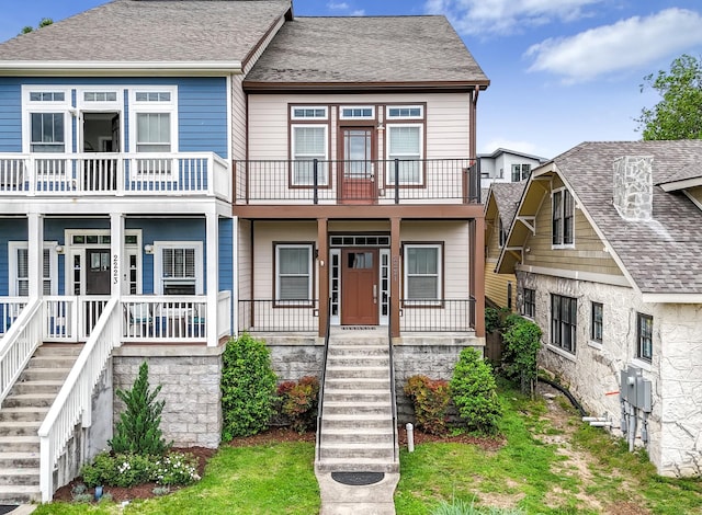 2221 10th Ave S, Nashville, TN 37204 - view of property with covered porch, a balcony, and stairway