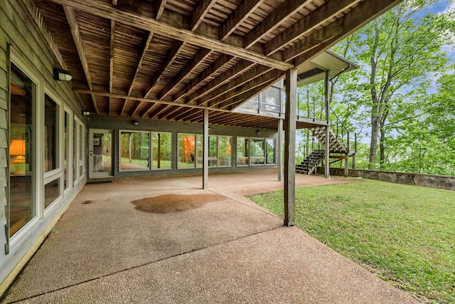 view of patio / terrace featuring stairs
