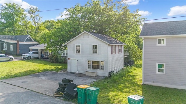 108 7th Ave S, Lewisburg, TN 37091 - back of house featuring a patio and a lawn