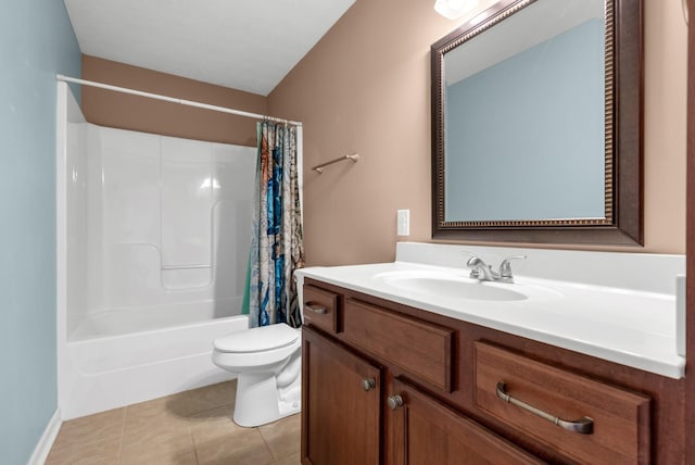 bathroom with toilet, tile patterned floors, vanity, and shower / bath combo with shower curtain