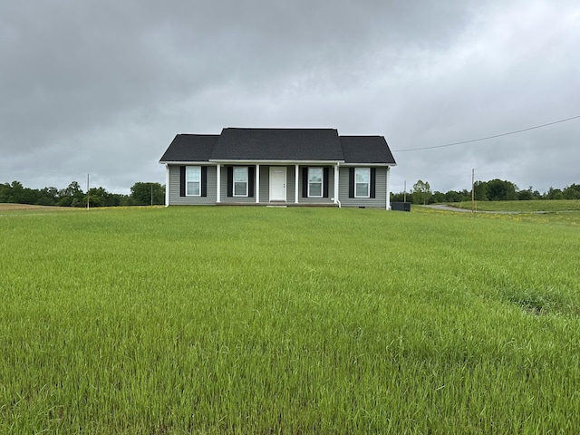 view of front of property with a front lawn