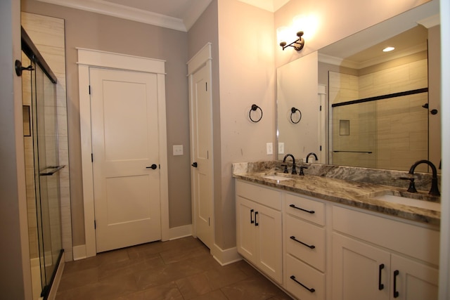 106 Nickolas Cir, Lebanon, TN 37087 - bathroom featuring a sink, crown molding, double vanity, and a stall shower