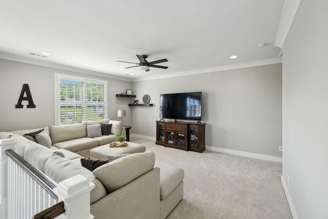 living room featuring ornamental molding, visible vents, ceiling fan, light carpet, and baseboards