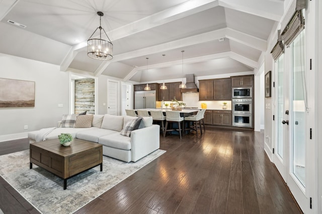 living room with an inviting chandelier, dark wood finished floors, visible vents, and vaulted ceiling with beams