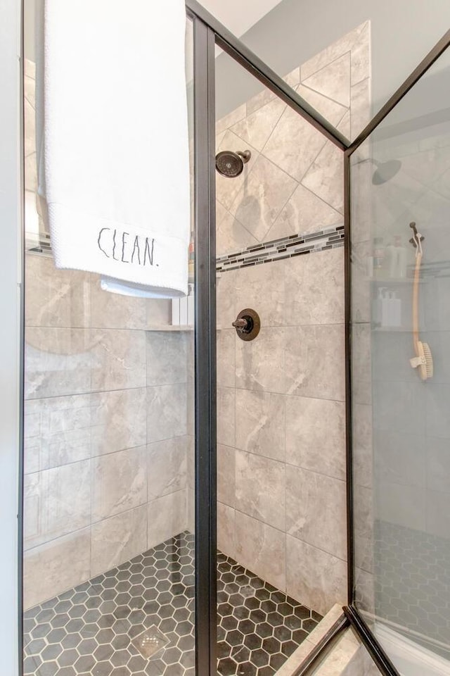 bathroom featuring a stall shower