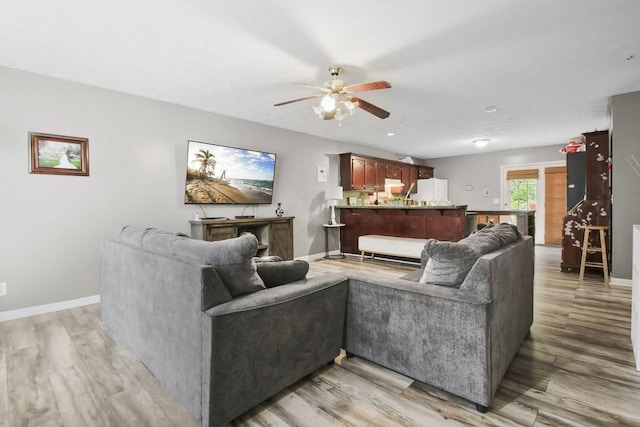 119 Sleepy Hollow Dr, Springfield, TN 37172 - living room with a ceiling fan, light wood finished floors, and baseboards