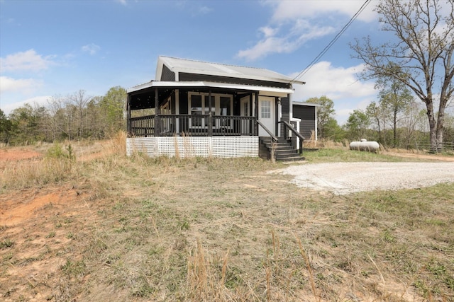 view of front of property with metal roof