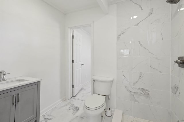 bathroom with toilet, marble finish floor, baseboards, a tile shower, and vanity